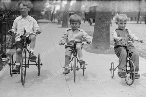 Young Boys Riding Tricycle Down Sidewalk 1920 Vintage 8x10 Reprint Of Old Photo - Photoseeum