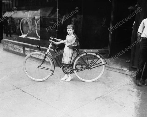 Young Girl Outside Of Bicycle Shop New Bike Vintage 8x10 Reprint Of Old Photo - Photoseeum
