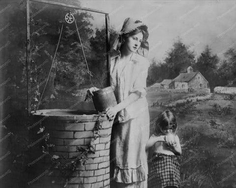 Victorian Lady At Well With Small Child  8x10 Reprint Of Old Photo - Photoseeum