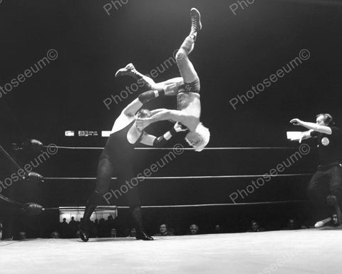 Sargent Slaughter Throws Rick Flair Wrestling Vintage 8x10 Reprint Of Old Photo - Photoseeum